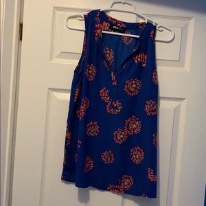 Blue flowered sleeveless blouse